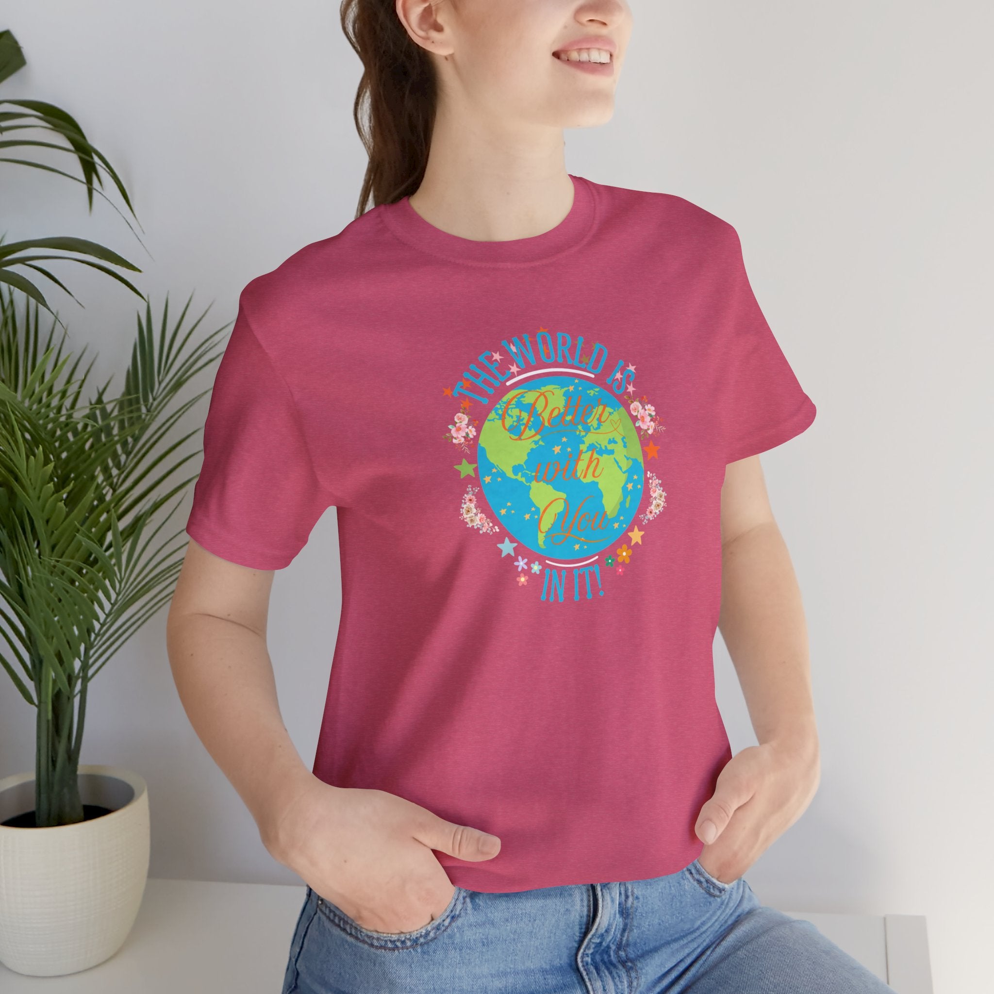 Inspirational Women's Tee with Flowers and Stars by Doctor T-Shirt Studio, featuring a woman in a red shirt with a cursive quote and floral design.