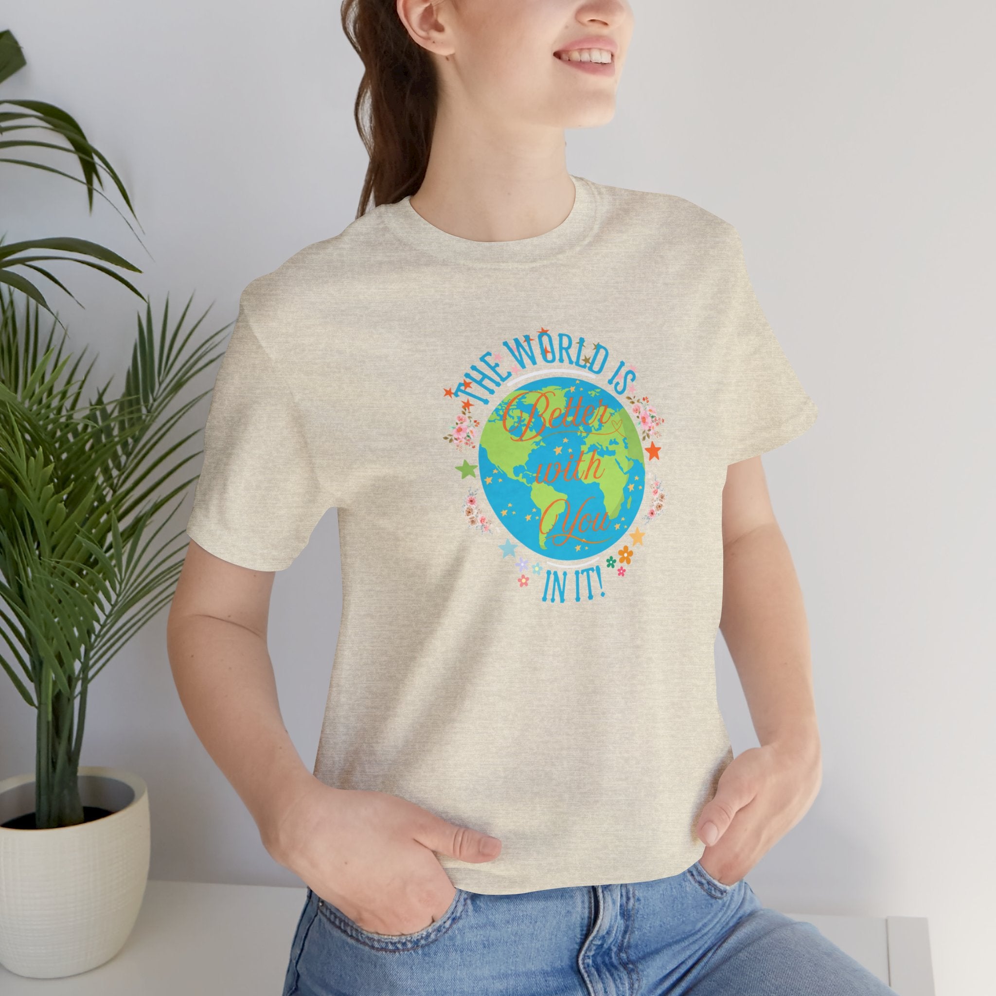 Inspirational Women's Tee with Flowers and Stars by Doctor T-Shirt Studio, featuring a woman in a tan shirt with a cursive quote and floral design.