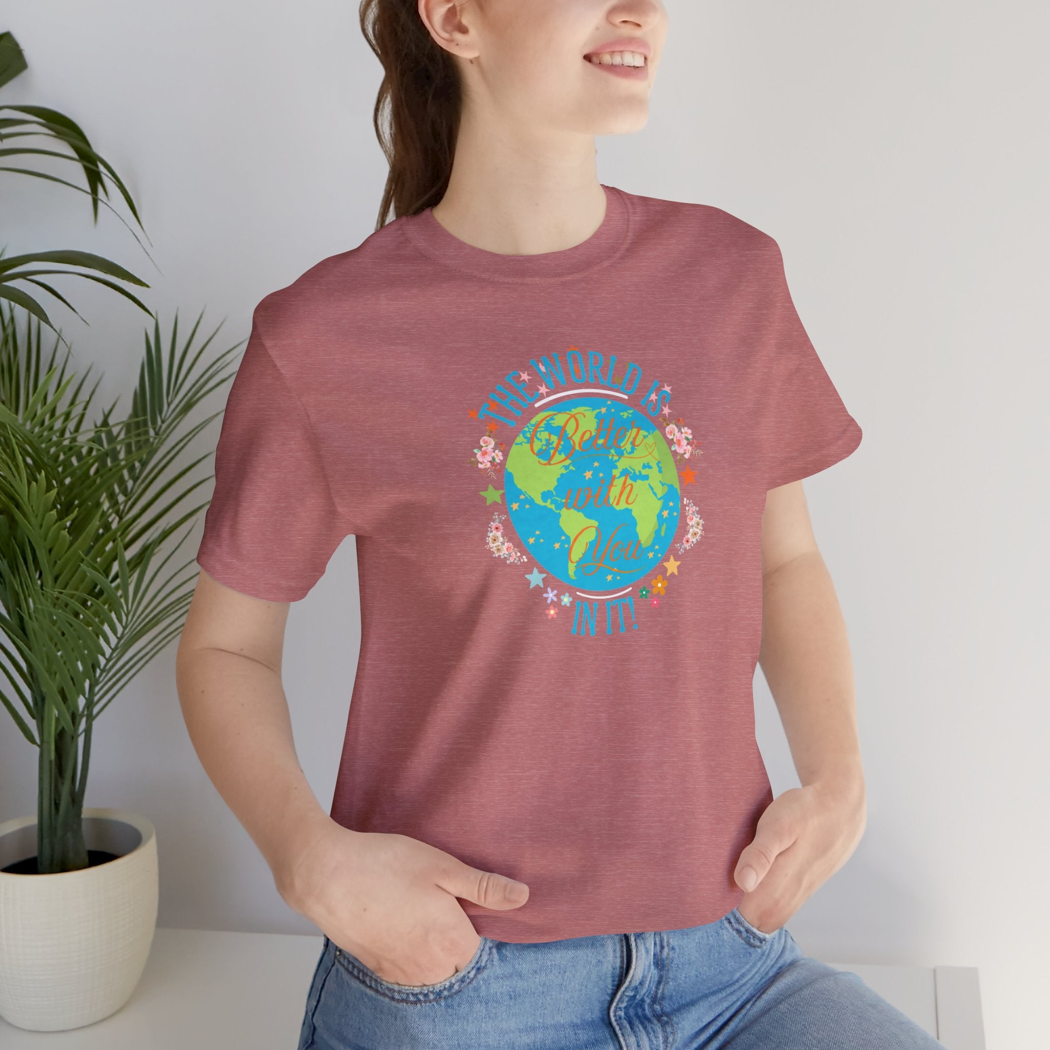 Inspirational Women's Tee with Flowers and Stars by Doctor T-Shirt Studio, featuring a woman in a red shirt with a cursive quote and floral design.