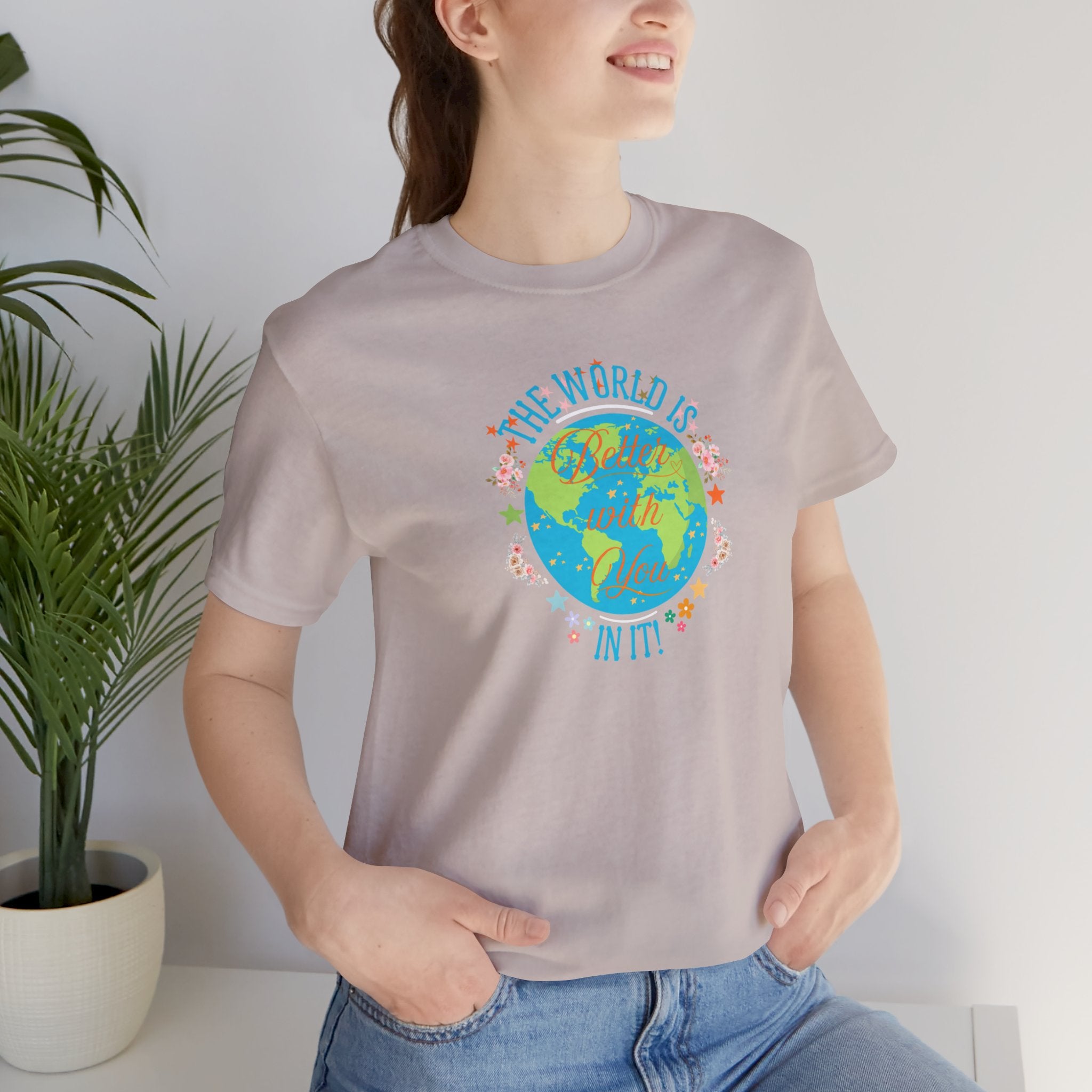 Inspirational Women's Tee with Flowers and Stars by Doctor T-Shirt Studio, featuring a woman in a heather grey shirt with a cursive quote and floral design.