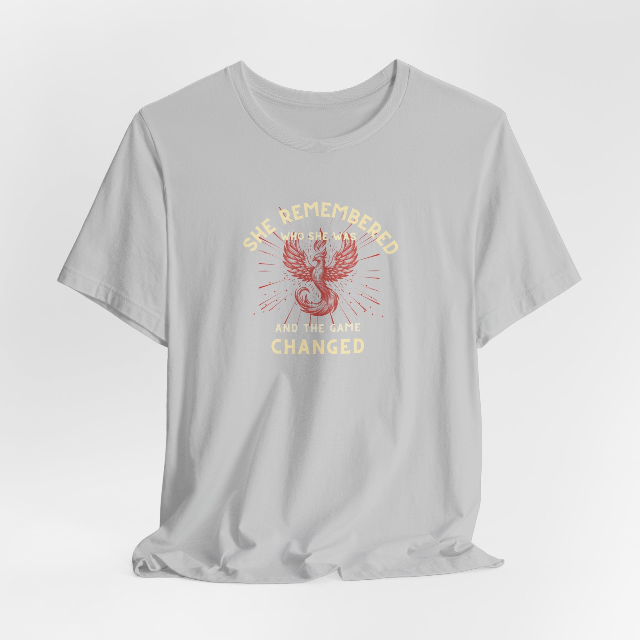 Women's Motivational Quote Tee - Red Phoenix by Doctor T-shirt Studio featuring a red phoenix graphic on a grey shirt, symbolizing strength and inspiration.