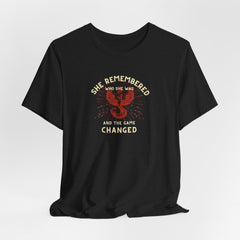 Women's Motivational Quote Tee - Red Phoenix by Doctor T-shirt Studio featuring a red phoenix graphic on a black shirt, symbolizing strength and inspiration.