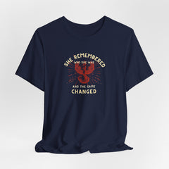 Women's Motivational Quote Tee - Red Phoenix by Doctor T-shirt Studio featuring a red phoenix graphic on a navy shirt, symbolizing strength and inspiration.